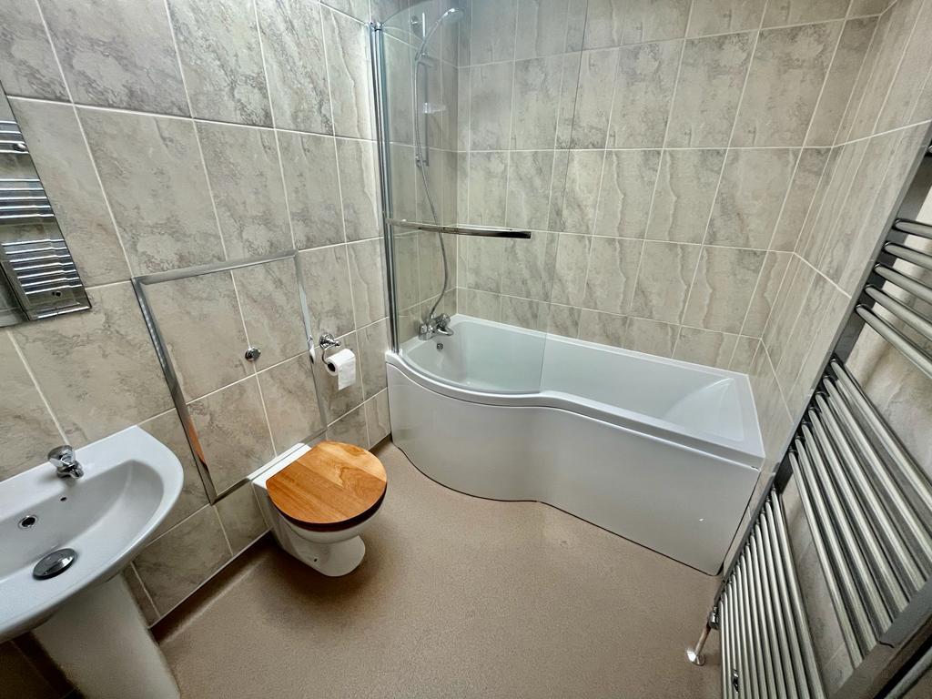 A modern facilities bathtub in a bathroom