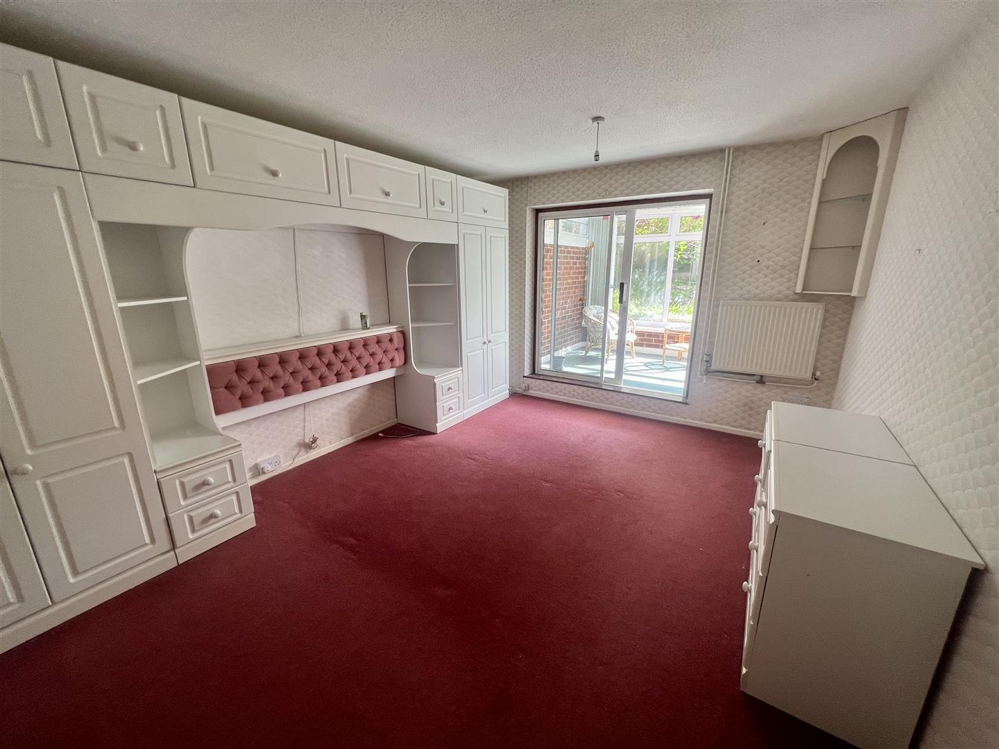 view of an empty room with cabinets