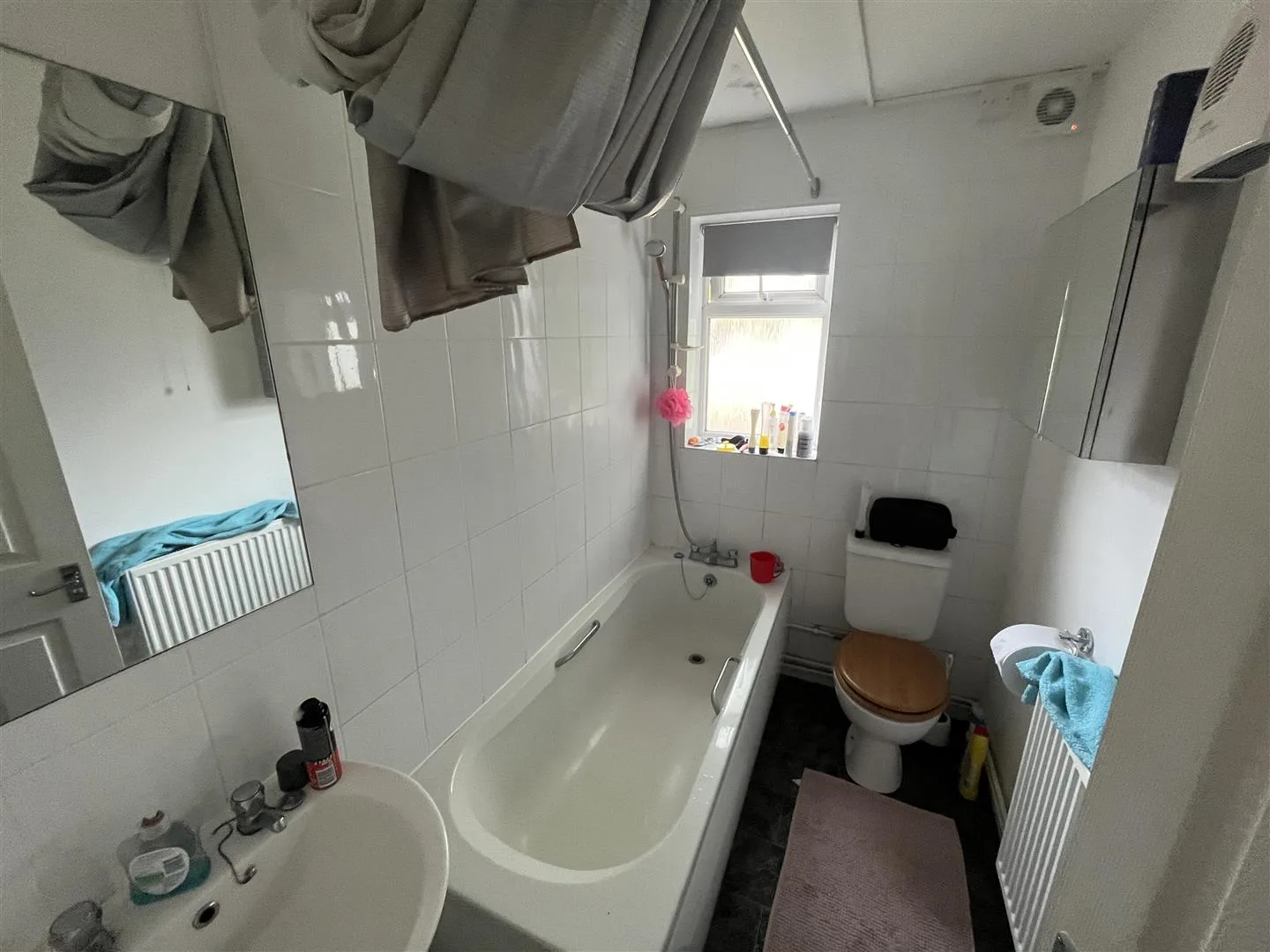 Inside view of a bathroom inside a house with bathtub
