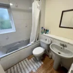 Inside view of a kitchen bathroom with a bathtub